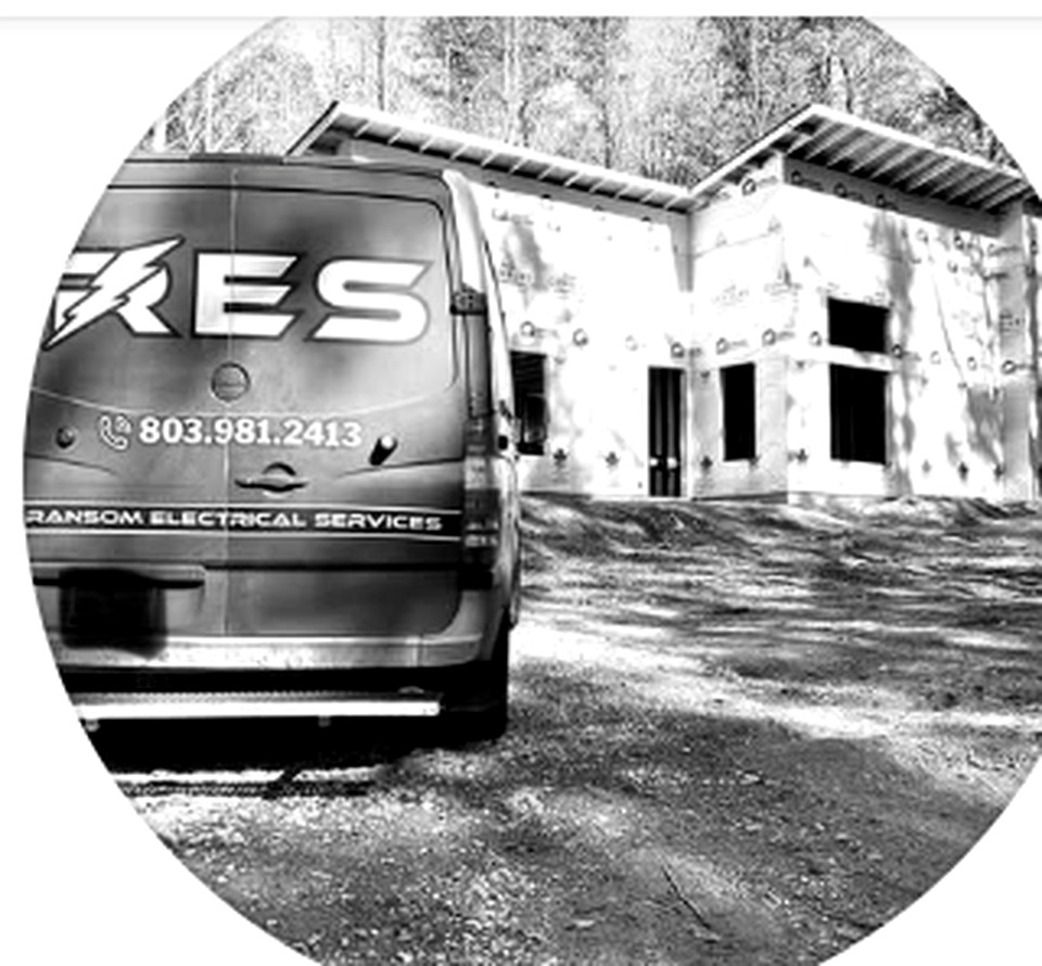 Ransom Electrical Services work van at a job site